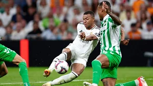 | Photo: AP/Pablo Garcia : La Liga 2024-25 Real Madrid vs Real Betis: Betis' Natan, right, challenges Real Madrid's Kylian Mbappe 