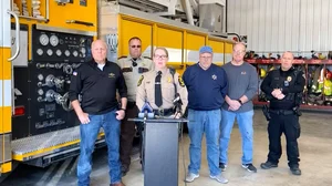 AP : Illinois State Police Capt. Jody Huffman, at the podium, speaks during a news conference about the incident.