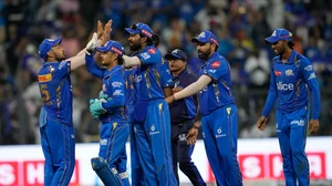 AP Photo/ Rafiq Maqbool : Mumbai Indians' players celebrate their win during the Indian Premier League match between Mumbai Indians and Delhi Capitals in Mumbai.