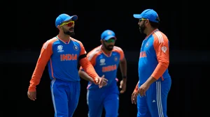 AP Photo/Ricardo Mazalan : Virat Kohli, Rohit Sharma, and Jasprit Bumrah