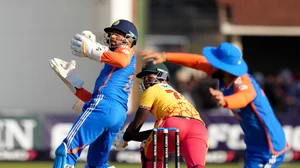 AP Photo/Tsvangirayi Mukwazhi : Zimbabwe batsman Luke Jongwe, centre, in action during the T20 cricket between Zimbabwe and India at Harare Sports Club, Harare.