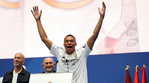 AP/ Andrea Comas : Kylian Mbappe being presented in the new Real Madrid colours.