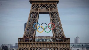 AP/Aurelien Morissard : Olympic rings are seen on the Eiffel Tower.