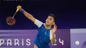 AP Photo/Kin Cheung : India's Lakshya Sen plays against Taiwan's Chou Tien-Chen during their men's singles badminton quarter-final match at the 2024 Summer Olympics.