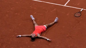 AP/Andy Wong : China's Zheng Qinwen celebrates as she defeats Croatia's Donna Vekic.