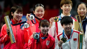 AP : China gold medalists, right, and Japan silver medalists, left, pose during the medal ceremony of the women's team table tennis match at the 2024 Summer Olympics