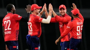 AP/Ricardo Mazalan : England cricket team