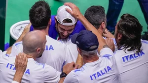 AP/Manu Fernandez : Italy's Matteo Berrettini celebrates after winning against Australia's Thanasi Kokkinakis during the Davis Cup semifinal at the Martin Carpena Sports Hall.