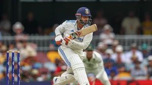 AP Photo/Pat Hoelscher : India's Rishabh Pant bats during play on day three of the third cricket test between India and Australia at the Gabba in Brisbane.