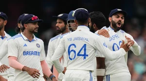 AP Photo/Mark Baker : India's Virat Kohli, right, celebrates with Jasprit Bumrah after the wicket Australia's Usman Khawaja during play on the first day of the fifth cricket test between India and Australia at the Sydney Cricket Ground.