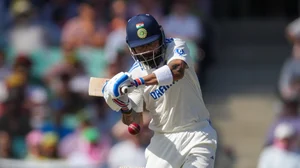 AP Photo/Mark Baker : India's Virat Kohli bats during play on the second day of the fifth cricket test between India and Australia at the Sydney Cricket Ground, in Sydney.