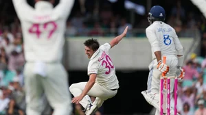 Photo: AP : Pat Cummins falls as he appeals unsuccessfully for a wicket during  the second day of the fifth Test between India and Australia at the Sydney Cricket Ground.