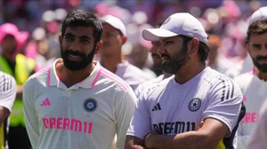 AP Photo/Mark Baker : India's Jasprit Bumrah talks with teammate India's captain Rohit Sharma, right, following the fifth cricket test between India and Australia at the Sydney Cricket Ground, in Sydney.