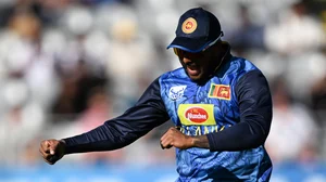 Andrew Cornaga/www.photosport.nz : Sri Lanka's Avishka Fernando celebrates after taking a catch to dismiss New Zealand's Will Young during the 3rd one day international cricket match at Eden Park in Auckland, New Zealand, Saturday, Jan. 11, 2025