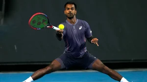 AP : Sumit Nagal in action against Tomas Machac at Australian Open 2025.