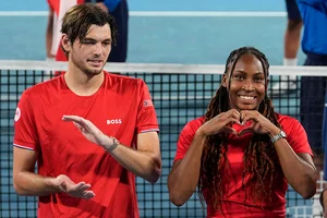 | Photo: AP/Rick Rycroft : United Cup Tennis: Coco Gauff of the U.S. and Taylor Fritz during the award ceremony