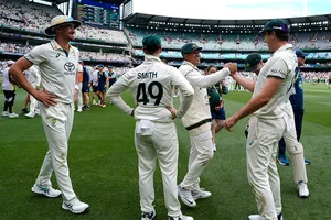 | Photo: AP/Asanka Brendon Ratnayake : India Vs Australia, 4th Test Day 5: Australian players celebrate after winning the fourth test