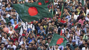 AP : Student protesters with Bangladeshi flag |