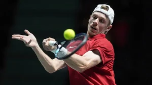 | Photo: Martin Rickett/PA via AP : Davis Cup Tennis, Argentina vs Canada: Canada's Denis Shapovalov in action against Argentina's Francisco Cerundolo