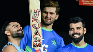 X/@ICC : Virat Kohli with Shaheen Shah Afridi and Shadab Khan