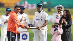 X/ICC : India's head coach Rahul Dravid presents the 100th Test cap to Ravichandran Ashwin before the start of the fifth Test cricket match between India and England, in Dharamshala, Thursday, March 7, 2024.