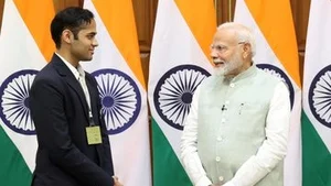 X/ArjunErigaisi : Arjun Erigaisi with Narendra Modi.