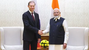 X/@narendramodi : Prime Minister Narendra Modi (R) with Russian Deputy PM Denis Manturov (L).