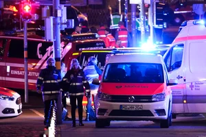 AP Photo/Ebrahim Noroozi : Emergency services work in a cordoned-off area near a Christmas Market, after an incident in Magdeburg, Germany, Friday, Dec. 20, 2024. 