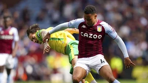 Aston Villa's Jacob Ramsey, right, and Norwich City's Mathias Normann battle for the ball during their English Premier League match.