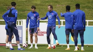 England's John Stones and Harry Kane take part in a training session on June 10, 2022.