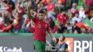 Joao Cancelo celebrates after scoring Portugal's first goal during UEFA Nations League match against