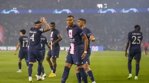 PSG's Kylian Mbappe celebrates with teammates after scoring a goal against Juventus.