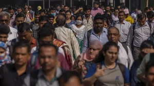 Commuters leave at Chhatrapati Shivaji Maharaj train terminus in Mumbai.