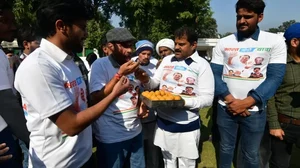 Congress workers celebrating assembly poll of Himachal Pradesh in New Delhi.