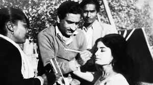 Making Others Look Good Ram Tipnis working on actress Rajshree on the set of Janwar (1965)