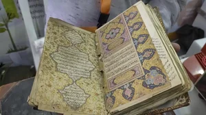 Gold ink Quran preserved by RSS-inspired body on display at Science Congress