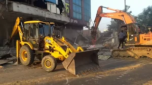 Bulldozers demolishing illegal structure (representative image)