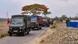 Army and Assam Rifles personnel conduct a flag march in violence-hit areas amid tribal groups protest over court order on Scheduled Tribe status, Manipur.