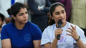 File photo : Indian wrestlers Vinesh Phogat and Sakshi Malik address the media at Jantar Mantar in New Delhi.