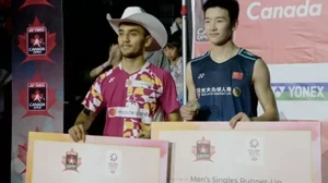 Lakshya Sen (left) with the winner's medal as he poses with the runner-up, Li Shi Feng.