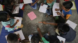 Children are seen during a group activity in a classroom at a government school in Himachal Pradesh