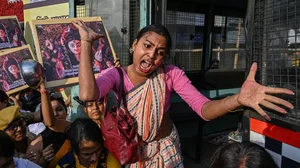 A transgender rights activist shouts slogans during an anti-government demonstration in Kolkata.