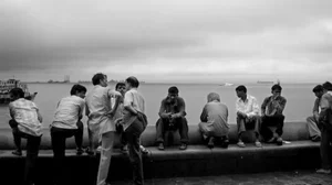 People gather to talk on September 09, 2005 in Mumbai