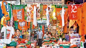 Election Season: A shopkeeper in Kolkata displays campaign material of political parties ahead of th