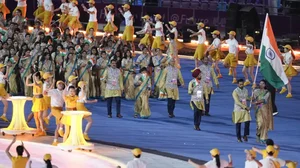 Athletes and team officials from India arrive during the opening ceremony of the 19th Asian Games.