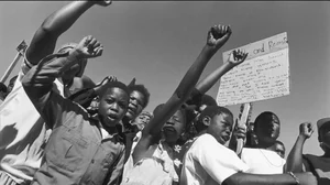 An anti-apartheid demonstration in Soweto, South Africa in 1989.