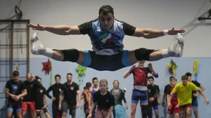 AP : Iranian wrestler Iman Mahdavi, a member of the Refugee Olympic team that will compete at Paris 2024, practises in Italy.