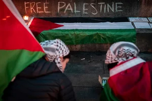 Photo: Ethan Cairns/The Canadian Press via AP : People celebrate the Gaza ceasefire