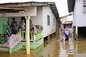 Photo: AP/Vincent Thian