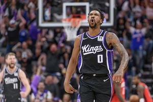 | Photo: AP/Randall Benton : NBA 2024-25: Kings guard Malik Monk (0) reacts after scoring a 3-point shot